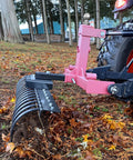 Side view of a 48 Inch Tow Behind Landscape Rake With 17 Steel Tines For ATV UTV And Tractor, 2 Inch Receiver, landscaping debris.