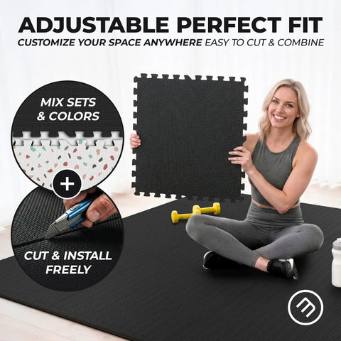 Woman holding Interlocking Foam Gym Mats Set With Edge Pieces For Full Floor Protection, black tile, 24 by 24 inch