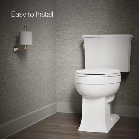 Archer Trip Lever For Two Piece Toilets In Vibrant Brushed Bronze Smooth Easy Clean Metal Construction installed on toilet