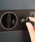 Close-up of a hand operating the LED keypad and lock on a Digital Drop Safe Money Drop Box With Front Deposit Slot, Steel Security Safe.