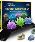 Awesome Crystal Growing Kit For Kids With Light Up Display Stand Grow Three Vibrant Crystals In Blue Purple And Green STEM Science Toy For Ages 8 To 12 Includes Gems Cool Gift For Curious Girls And Boys, featuring three colored crystals and a display stand with packaging.