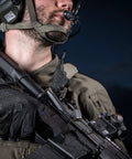 Person wearing Specialty Vent Tactical Gloves With Breathable Mesh And Palm Ventilation, holding rifle, X Large, Covert Black.