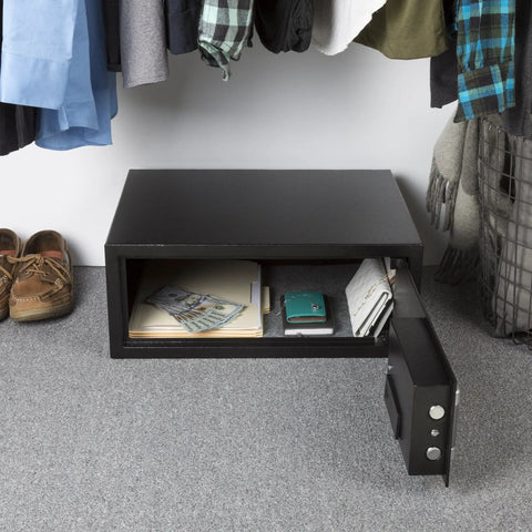 Digital Safe With LED Keypad And Two Manual Override Keys Keeps Your Cash Jewelry And Passports Locked Down At Home Office Or On The Go While Traveling, Rugged Build For Everyday Security And Easy Master And Guest Codes in a closet with open door showing contents.