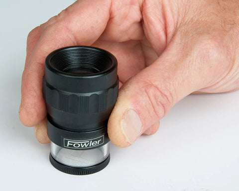 Close-up of hand holding the 10x Pocket Optical Comparator Set With 9 Reticles For Measuring Threads Angles Radii Circles And Lengths