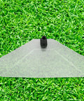 Windproof Dual Head Sprayer Nozzle Cover for Farm And Lawn Irrigation on grass, showing large plastic cover with nozzle attachment.