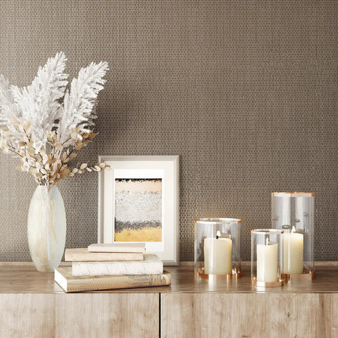 Taupe Metallic Grasscloth Peel And Stick Wallpaper Roll Featuring Faux Woven Texture With Subtle Shimmer on a stylish accent wall.