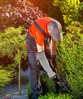 Man gardening with Built Like A Tank Cut Resistant Arm Sleeve Featuring Tough Hppe Knit and Stretch Fit Design for mechanics.