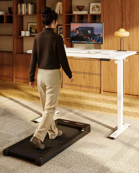 One Piece Standing Desk 48 By 24 Inch Seamless Desktop With Electric Height Adjustment for home office, side view with rug.