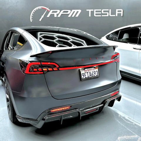 Mean Looking Sequential Led Tail Lights And Trunk Light Bar For Tesla Model 3 And Y Gen Two Slick Through Type Design installed on Tesla.