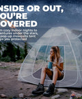Woman sitting inside Pop Up Mosquito Net For Bed And Camping Indoor Outdoor Bug Mesh Shelter with Quick No Tool Setup