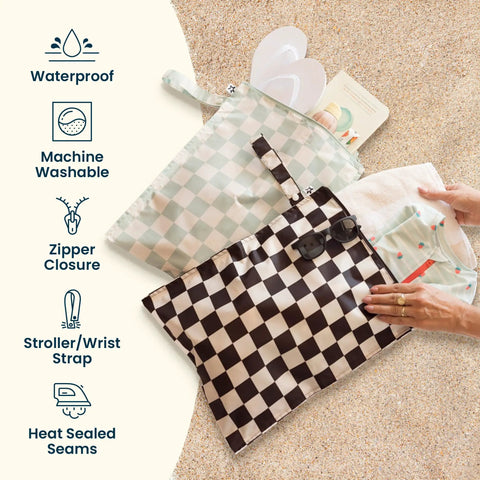 Mess-Proof Wet Bag Set 2-Pack Reusable Waterproof Bags For Swimsuits And Baby Clothes On The Go displayed with clothing and sunglasses.