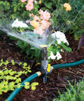 Adjustable Spike Sprinkler Bundle With Three Sprinklers And Two 15 Foot Hoses waters garden flowers gently
