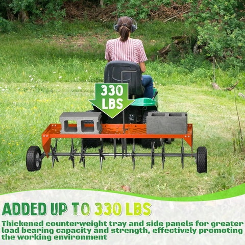 48 Inch Tow Behind Lawn Aerator With Universal Hitch showing weight tray holding 330 lbs, attached to lawn tractor