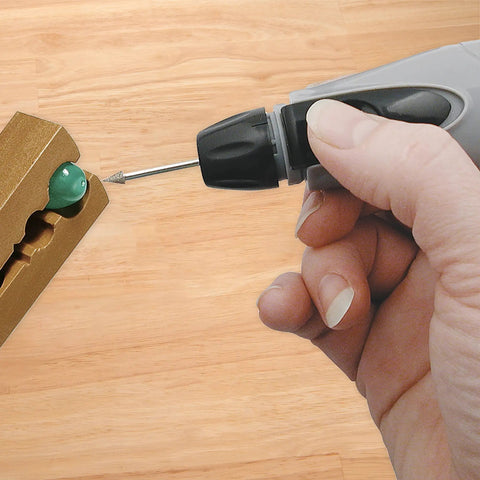 Cordless Motorized Bead Reamer For Opening And Enlarging Holes In Glass Ceramic Or Stone With 3 Diamond Points in use