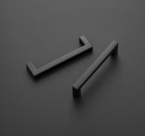 60 Pack 5 Inch Square Cabinet Handles Matte Black Drawer Pulls For Kitchen Cabinets And Cupboards Hardware, two handles on black surface