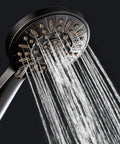 High Pressure Handheld Shower Head With Six Settings in action, showing water flow, oil rubbed bronze finish