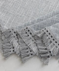Close-up of tassel linen textured swag valances for farmhouse kitchen and small windows light filtering rustic topper in cozy gray