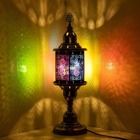 Multi Color Carved Glass Hexagonal Table Lamp With Stained Mosaic Glass And Retro Metal Frame casting colorful glow