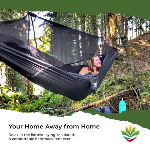 Woman relaxing in a Bug Free Sky Bed Camping Hammock Tent with Flat Lay Sleep in a forest, highlighting asymmetrical design.