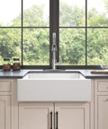 YZZY Single Handle Kitchen Sink Faucet with Pull Down Sprayer Stainless Steel Single Hole Bar Faucet High Arc Chrome Pull Out Kitchen Faucet installed in kitchen sink with natural light.