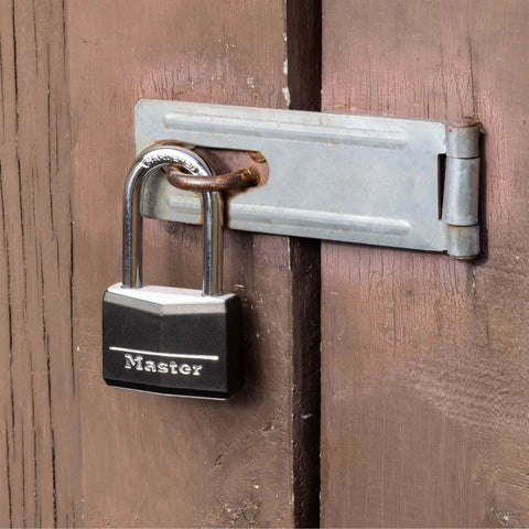 Black Covered Aluminum Lock with Key for Gym Lockers and Outdoor Use on wooden gate