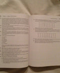 Open textbook: Systems Engineering and Analysis, Amazon edition, two pages of questions visible.