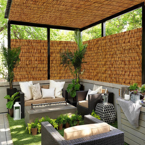 Outdoor seating area with Privacy Screen Made Of Bamboo Reed Fencing For Patio And Backyard Hangout, 4 Feet High Outdoor Privacy Barrier