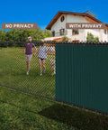 Heavy Duty Privacy Fence Screen 4x50 Ft Mesh Shade Net 170GSM With 90 Percent Blockage For Wall Garden Yard Backyard And Construction Sites Dark Green Weather Resistant And UV Stabilized For All Season Use installed on a fence