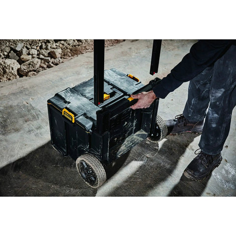Tough System 2.0 Mobile Storage Case With Auto Connect Side Latches 20 Percent More Storage 8 Inch All Terrain Wheels on dirt