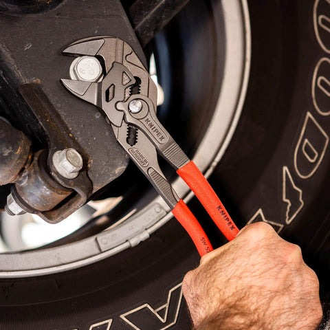 Heavy Duty 10 Inch Pliers Wrench With Adjustable Smooth Jaws used on automotive repair for reliable grip and chrome fittings.