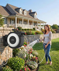 Woman using Retractable Garden Hose Reel 100Ft Wall Mount Heavy Duty Auto Rewind with Brass Fittings for garden watering