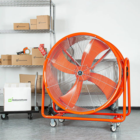 Smooth Rolling Industrial Drum Fan Cranking Out Serious Airflow To Crush Heat And Clear Smoke Quick 15000 Cfm Motor in orange finish.