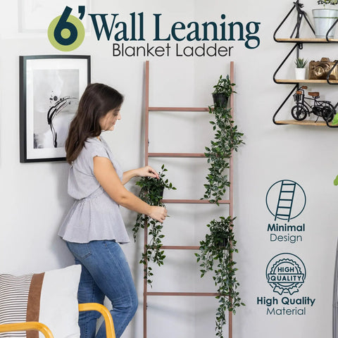 Woman arranging plants on a 5 Foot 8 Inch Blanket Ladder For Living Room And Bedroom With 6 Tiers Wall Leaning Laminate No Snag Construction