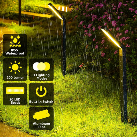 Solar Pathway Lights 4 Pack Outdoor Waterproof Garden Lighting for Driveway Walkway Patio Sidewalk Solar Powered with Cool to Warm White LEDs Easy Install Zero Hassle Setup and Weatherproof Design. Two lights in rain.