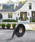 Self Adhering Asphalt Crack Tape 1.57 Inch By 50 Feet No Torch Required Easy Fix For Driveways Parking Lots Roofs And Roads 3mm Thick Durable Joint Repair Tape For Cracks And Gaps in front of a house