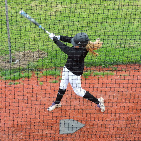 Baseball And Softball Batting Cage Net For Backyard Setup in use by player, twisted knotted black polyethylene with hitters door
