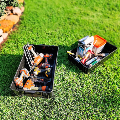 Stackable Plastic Storage Bins And Totes Modular Storage System 2.5 Cu Ft Organizing Containers For Home Garage And Office USA Made Durable Weatherproof Pack Of 2 with tools on grass