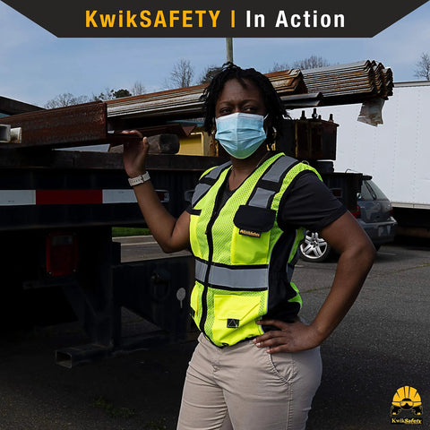 High Visibility Womens Safety Vest Class 2 Reflective Construction Workwear Yellow Medium worn with utility pockets on jobsite.