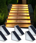 Solar Step Lights For Outdoors Waterproof IP67 Stair And Deck Lights Pack Of 6 installed on outdoor steps at night.