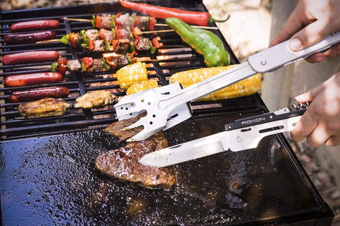 Using Six In One Folding Grill Utensils Set Featuring Fork Spatula Knife Tongs Bottle Opener And Corkscrew For Fourteen Inch Portable BBQ