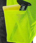 Kickass High Visibility Safety Vest Featuring Rock Solid Five Point Breakaway System Top Shelf Reflective Dry Mesh For Tough Job Sites No Sweat Adjustable Fit Road Crews SM, showing pocket with tools.