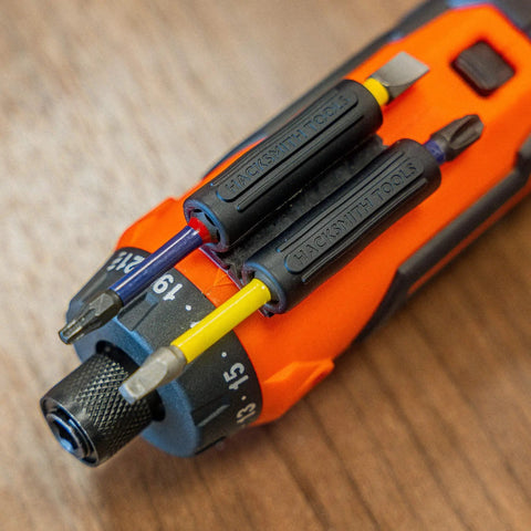 Heavy Duty Drill And Impact Driver Bit Holder With Silicone Bandolier And 3M Adhesive Universal Pro Grade Quick Change Bit Organizer For Fast Access 10 Slot Drill Accessories attached to drill