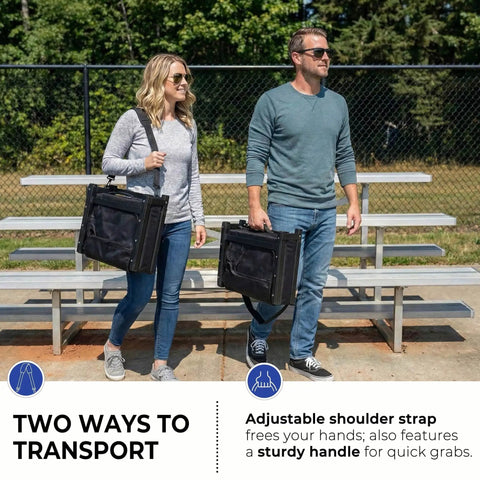 Two people carrying Comfy Stadium Bleacher Seat With Back Support And Thick Padded Cushion Includes Shoulder Strap Black Standard Size One Piece Bleacher Chair For Games Practices And Outdoor Events