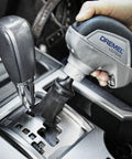 Cordless Power Scrubber Auto Detailing Kit With Four Cleaning Pads, Bristle Brush, Splash Guard, And Charger used on car interior