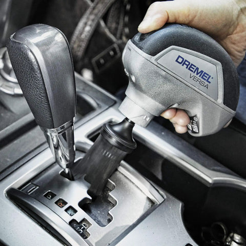 Cordless Power Scrubber Auto Detailing Kit With Four Cleaning Pads, Bristle Brush, Splash Guard, And Charger used on car interior