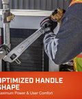 Offset Handle Aluminum Pipe Wrench For Tight Spaces Go-To Heavy Duty Plumber Tool 24 Inch Adjustable Wrench being used