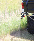 50 Gallon UTV Broadcast Sprayer With Precision And Boomless Booms Up To 30 Foot Swath 3 GPM EZ Lock Boom Mount on field