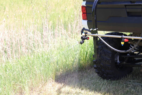 50 Gallon UTV Broadcast Sprayer With Precision And Boomless Booms Up To 30 Foot Swath 3 GPM EZ Lock Boom Mount on field