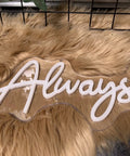 Forever Neon Sign For Weddings And Parties, Cold White LED Wall Decor For Bachelorette Nights, on a furry rug backdrop.