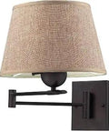 One Light Wall Sconce In Aged Bronze Finish With Beige Linen Shade Transitional Style With A Totally Timeless Vibe Hardwired And Wall Mounted Fabric And Metal Construction 11 Inch Wide 25 Inch Deep 13 Inch High Uses One 150W A21 Bulb Not Included